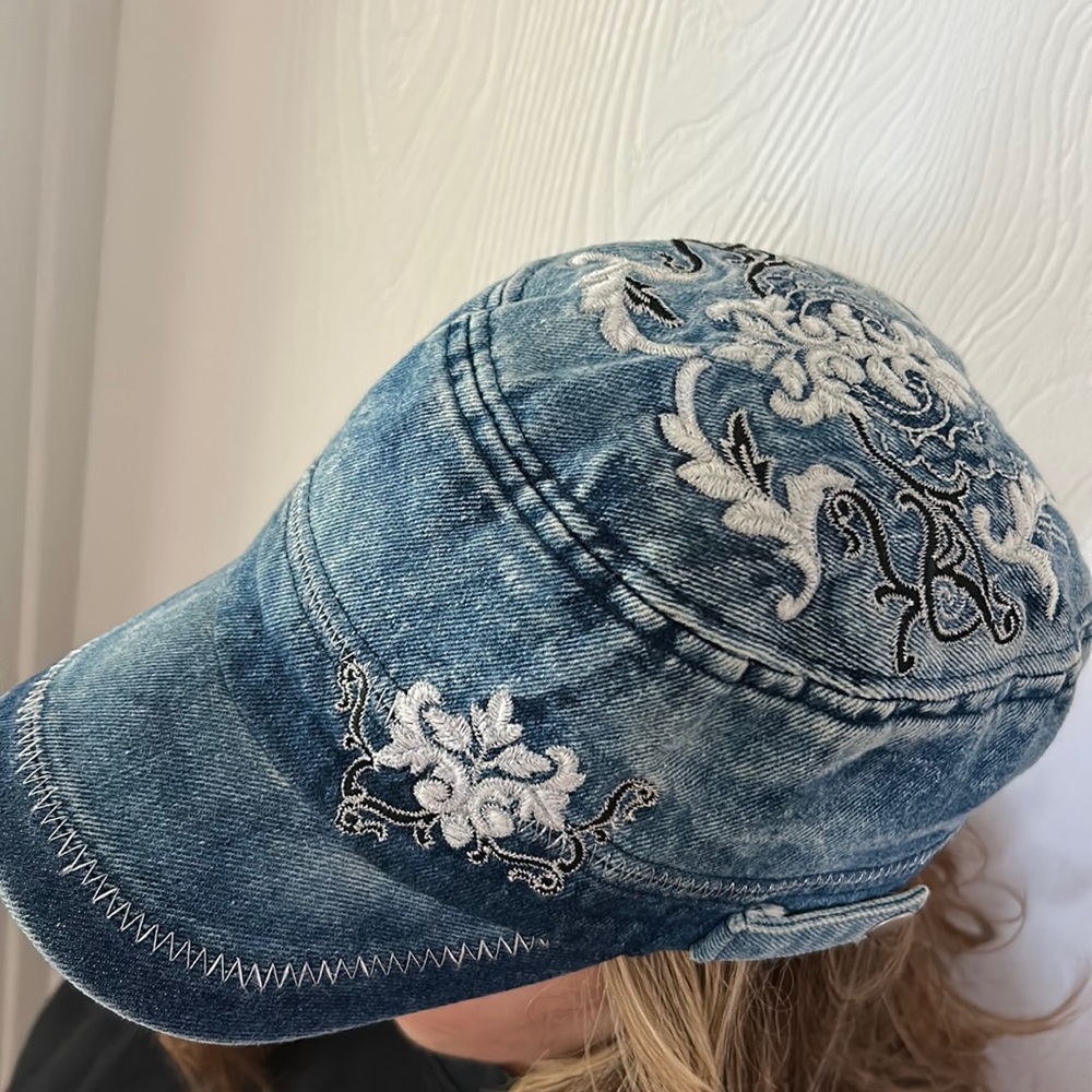 Ladies blue jean material hat with embroidered design